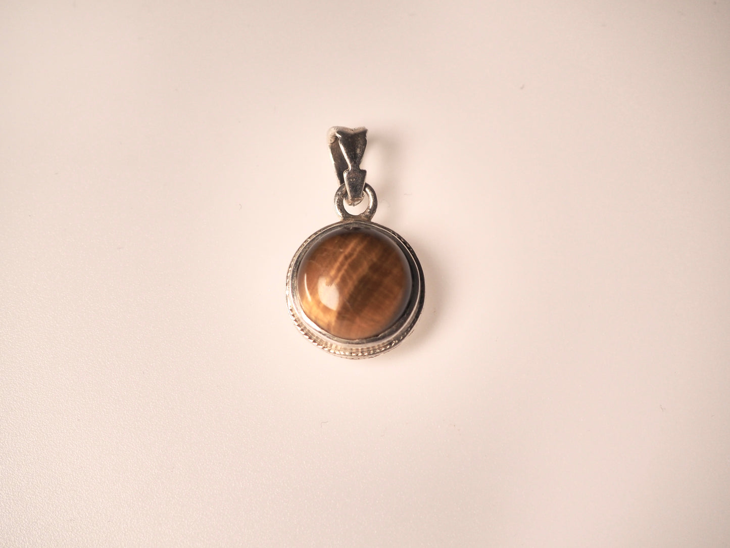 Tiger’s essence round Pendant
