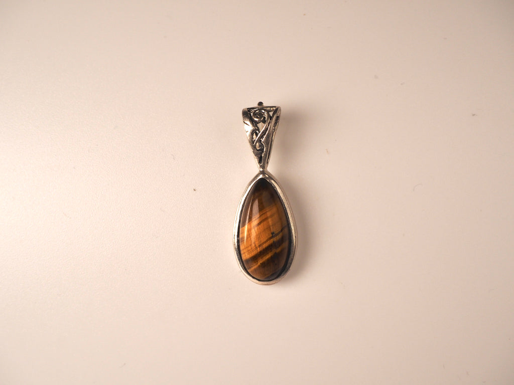 Tiger’s Essence drop pendant