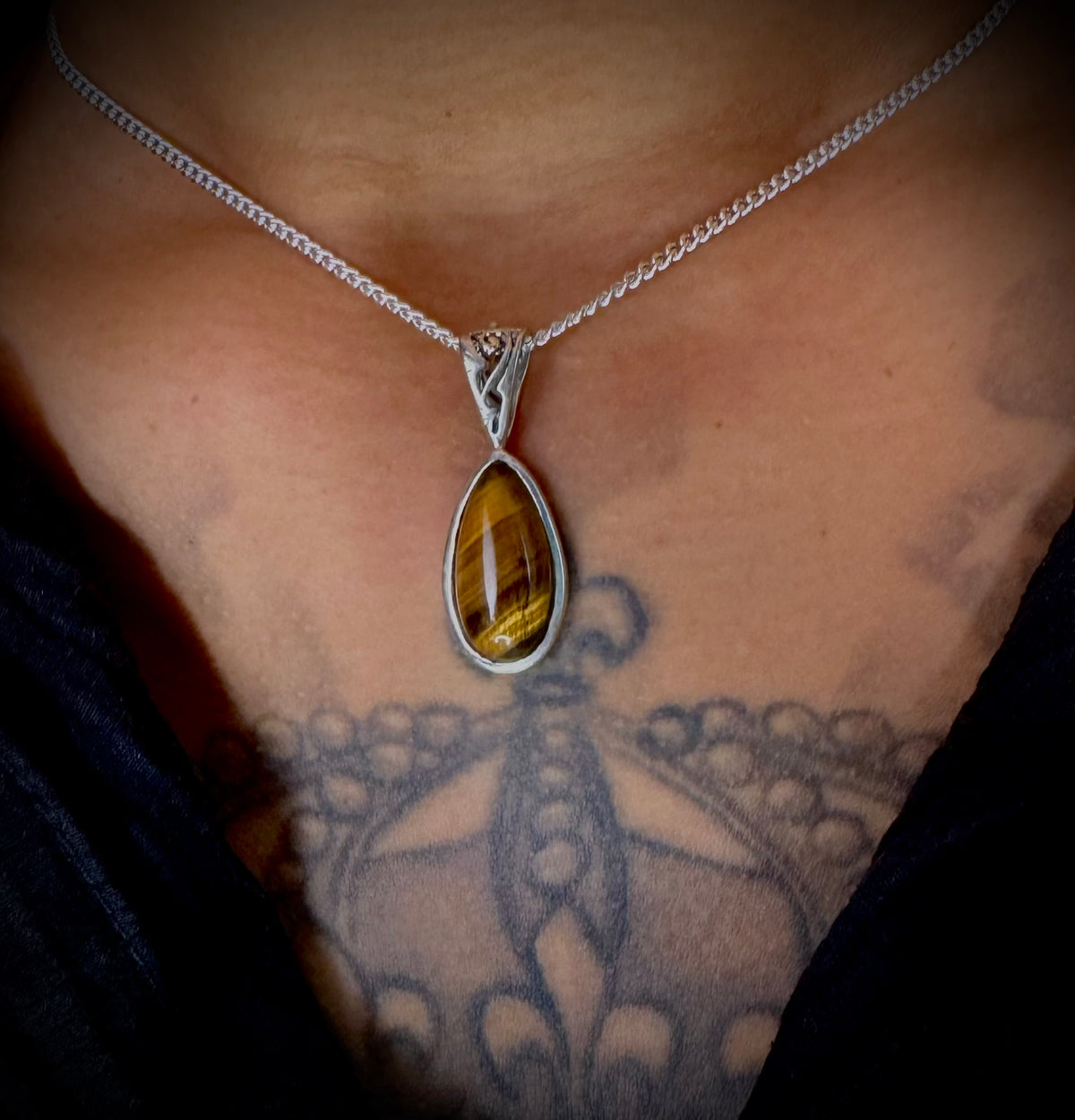 Tiger’s Essence drop pendant